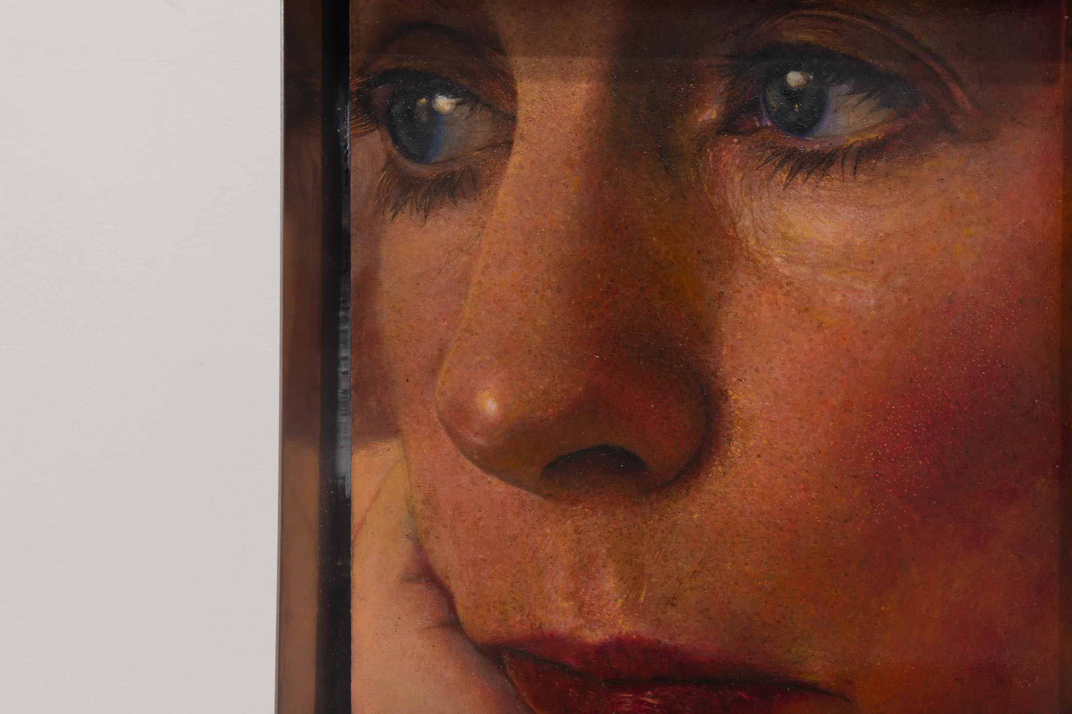 A painting by Ki Yoong of the closeup of a woman's face in a metal frame