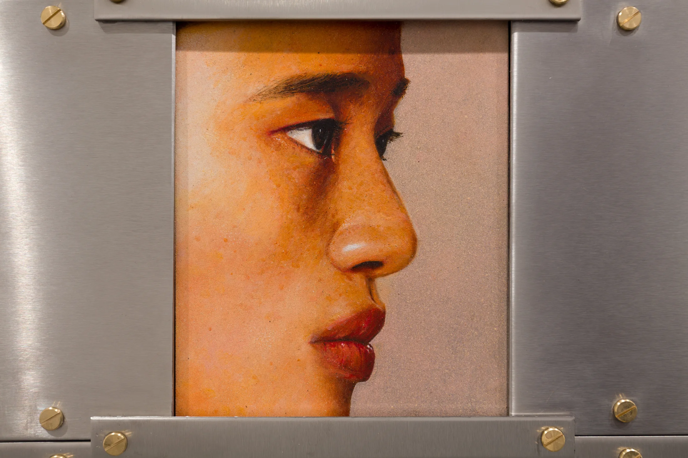 A painting by Ki Yoong of the side profile of a young man's face