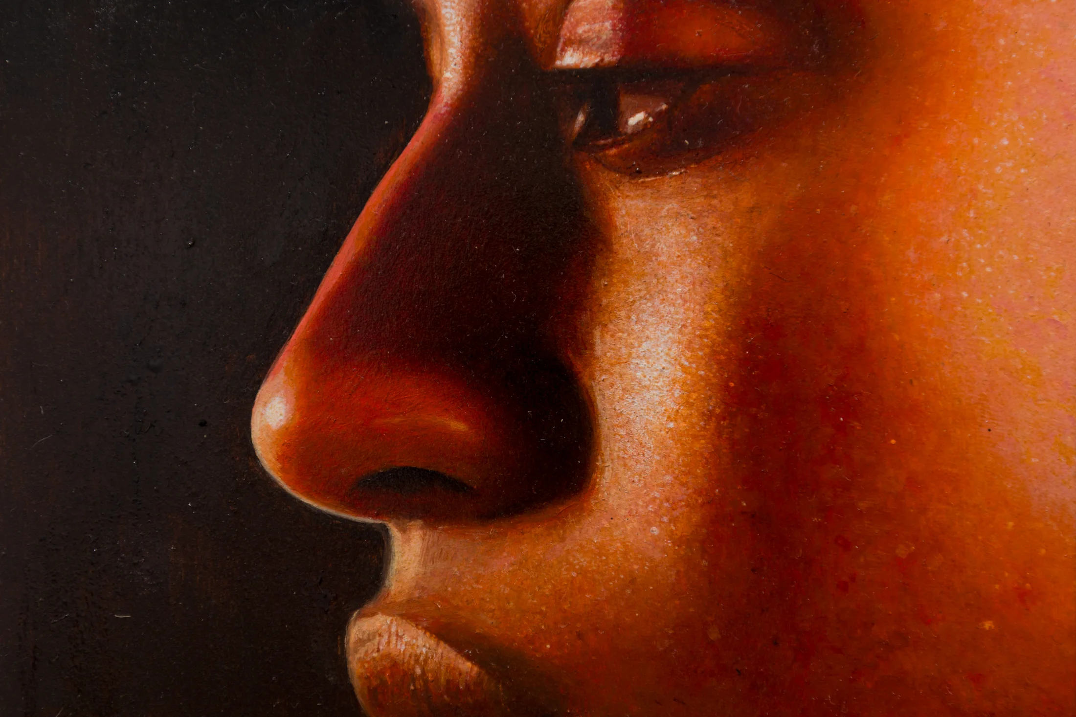 A painting by Ki Yoong of the side profile of a young man's face in a steel frame