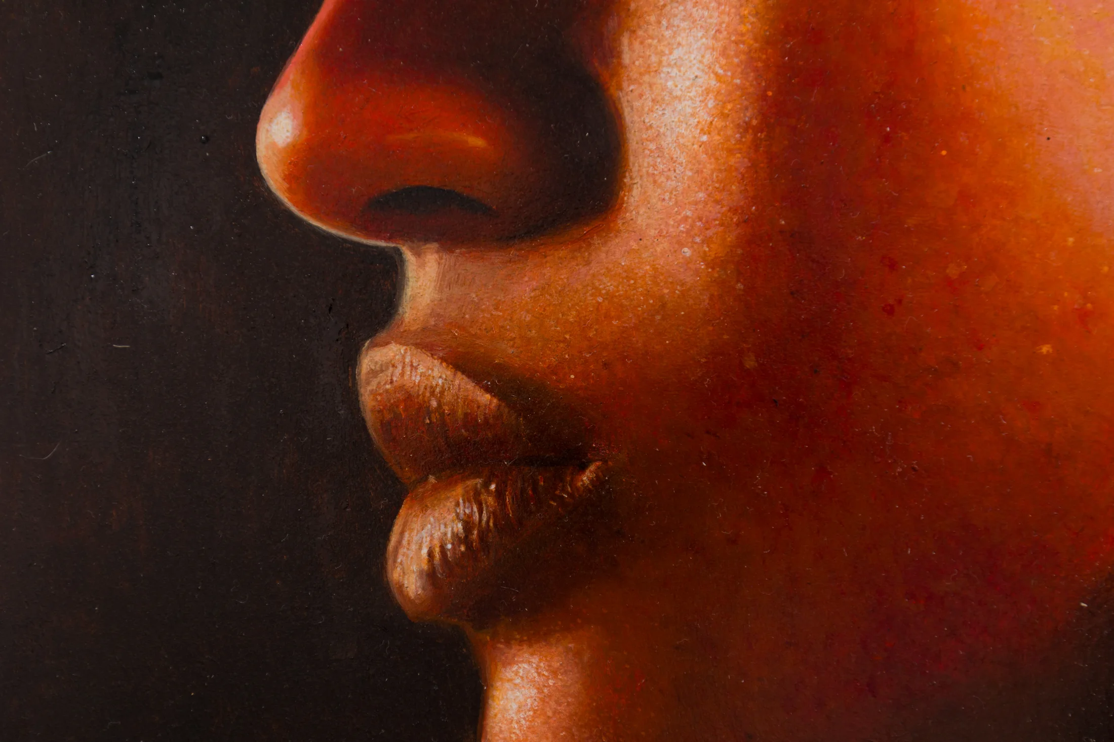 A painting by Ki Yoong of the side profile of a young man's face in a steel frame