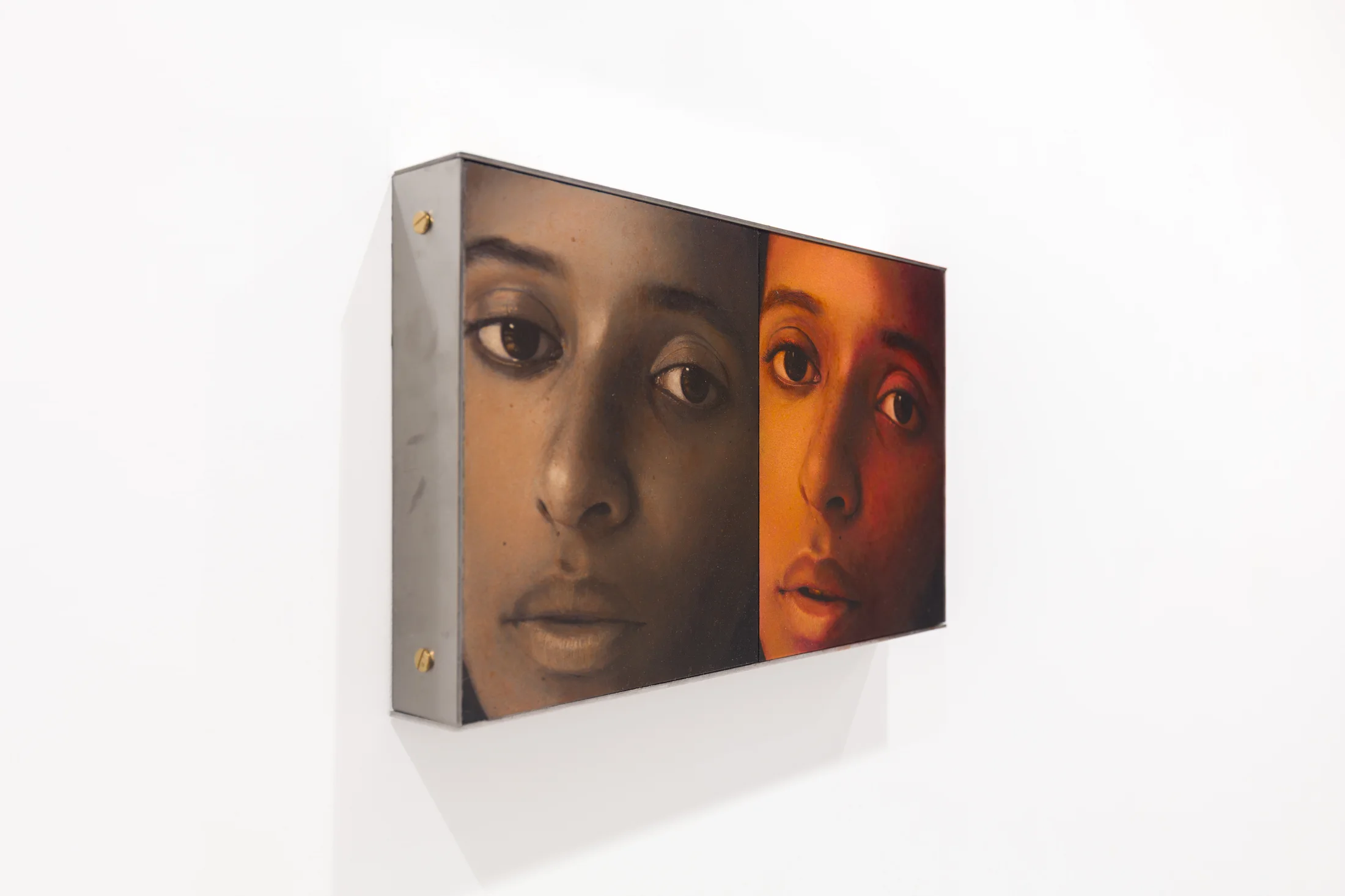 A diptych painting by Ki Yoong of two almost identical portraits of a young woman side by side