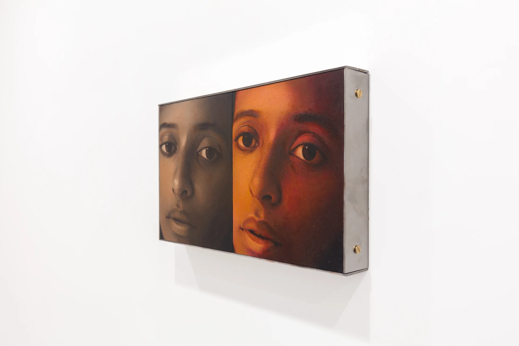 A diptych painting by Ki Yoong of two almost identical portraits of a young woman side by side