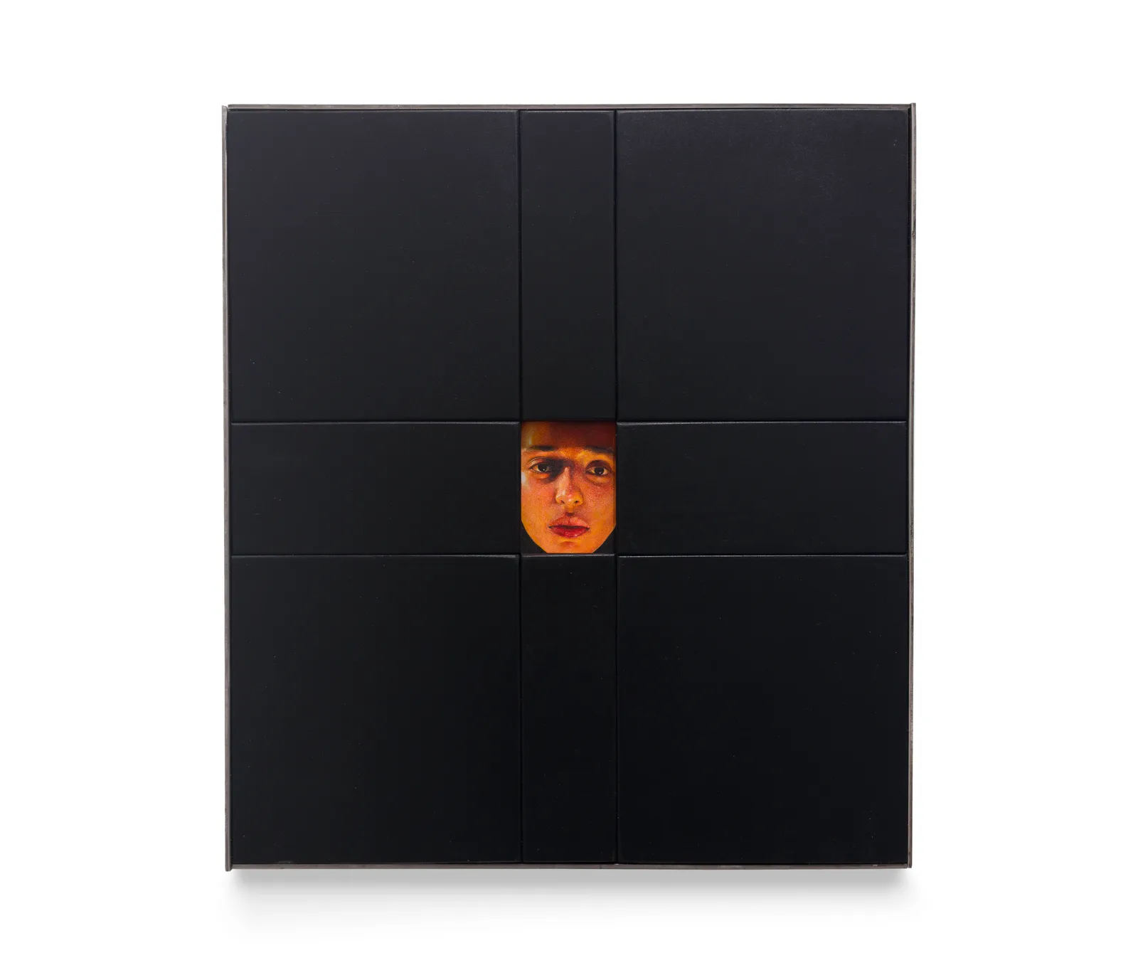 A painting by Ki Yoong of a woman's face framed within a large black wooden frame