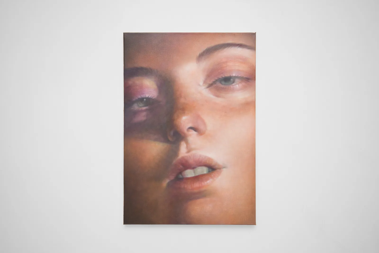 Close up of women's face with parted lips 