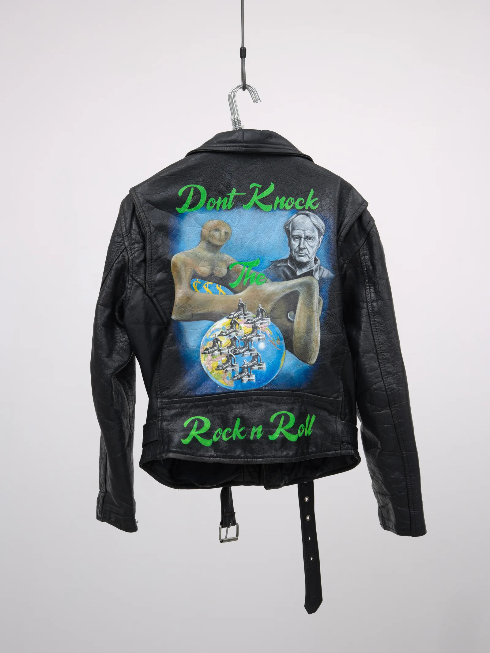 Black painted leather jacket with the text 'Don't knock the rock n roll'