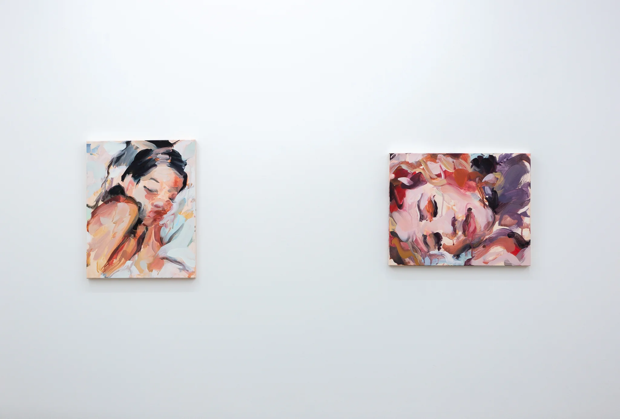 Installation shots of Laura Lancaster's solo show at Workplace London. Close up crop paintings of sleeping women and figures in landscapes, loosely painted.