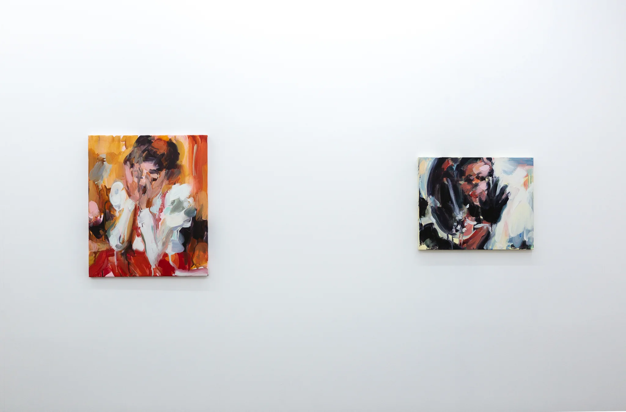 Installation shots of Laura Lancaster's solo show at Workplace London. Close up crop paintings of sleeping women and figures in landscapes, loosely painted.