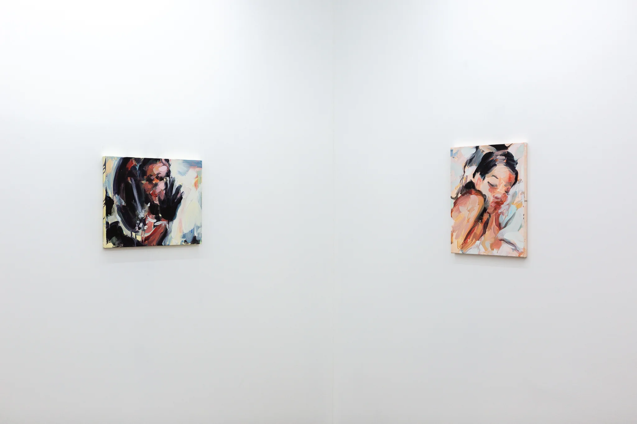 Installation shots of Laura Lancaster's solo show at Workplace London. Close up crop paintings of sleeping women and figures in landscapes, loosely painted.