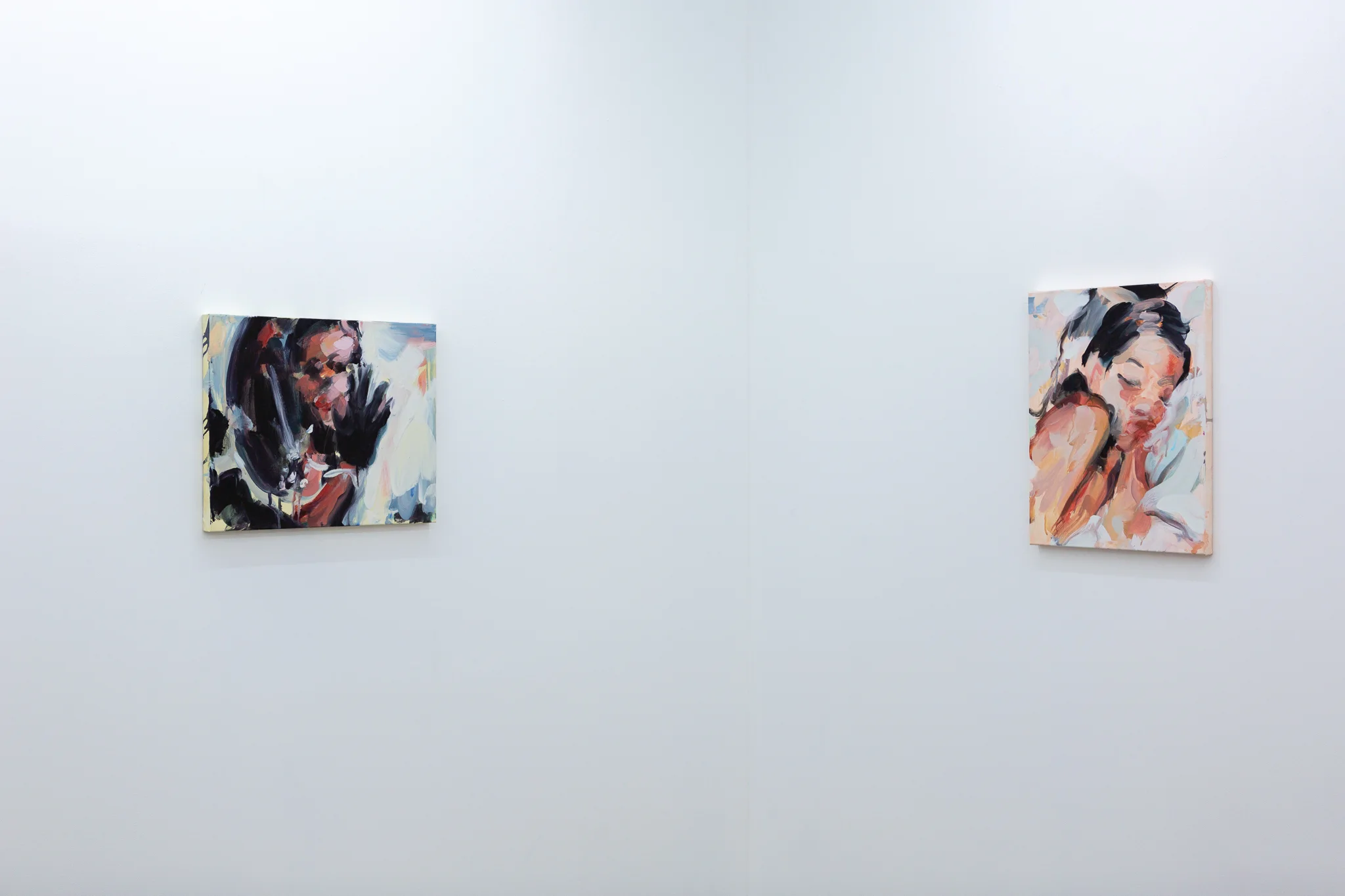 Installation shots of Laura Lancaster's solo show at Workplace London. Close up crop paintings of sleeping women and figures in landscapes, loosely painted.