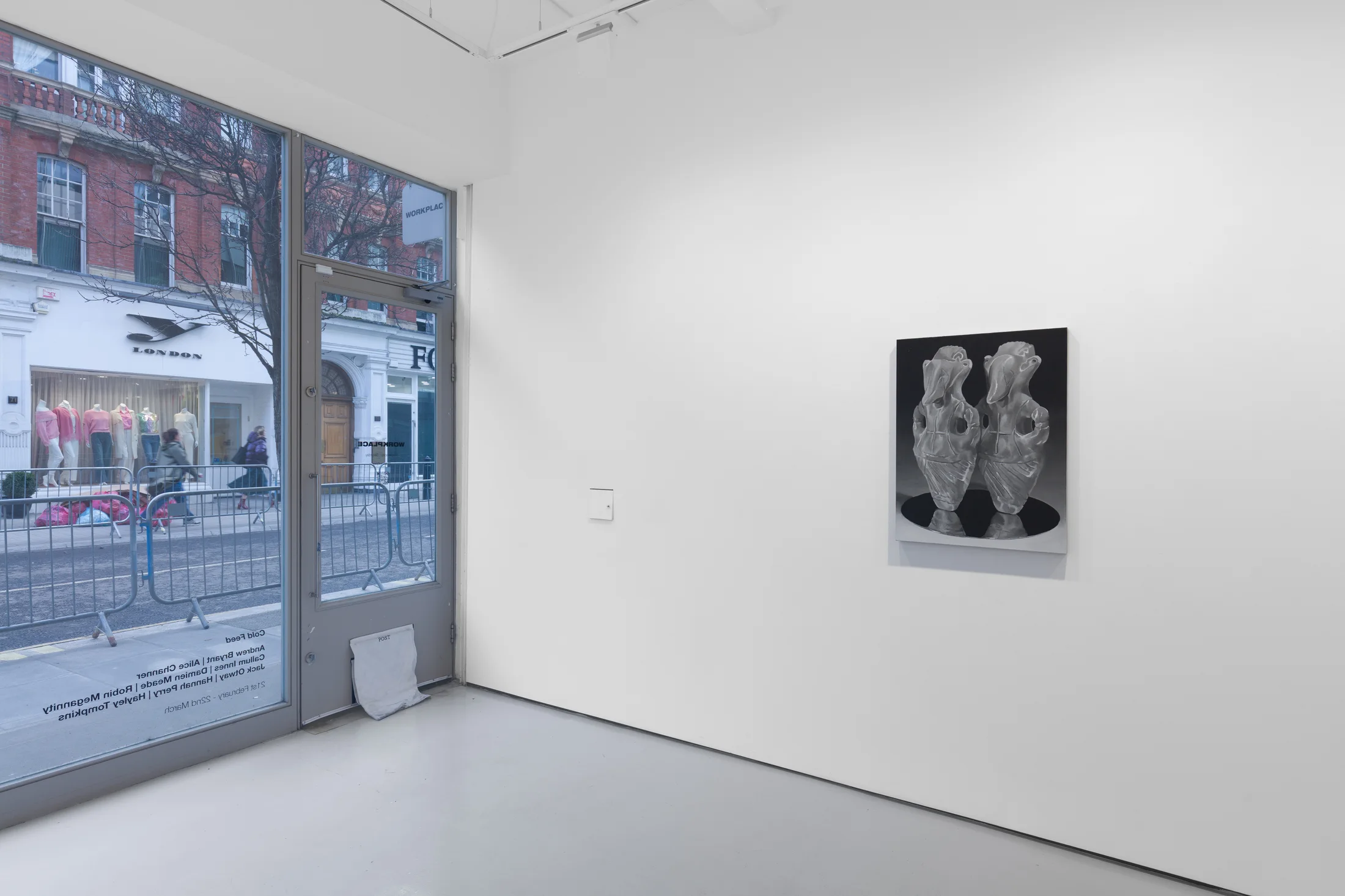 Installation view of the group exhibition Cold Feed at Workplace London including paintings and floor based sculpture