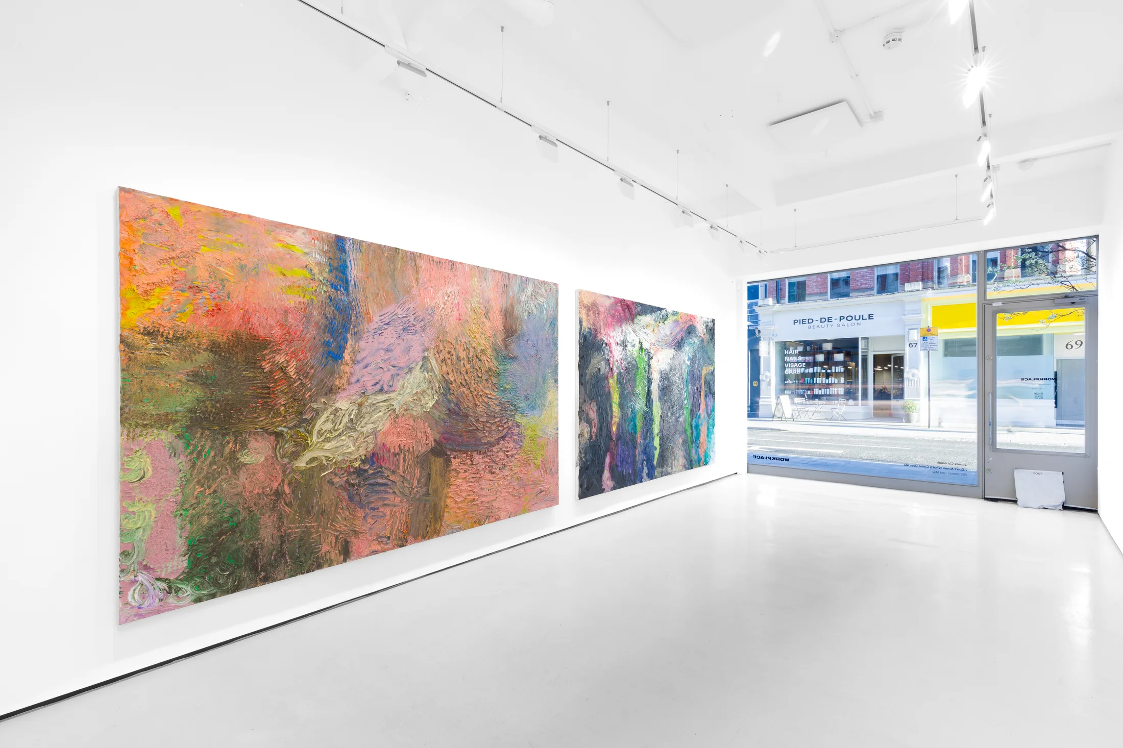 An installation view of James Cabaniuk's solo exhibition with two very large impasto oil paintings on the wall