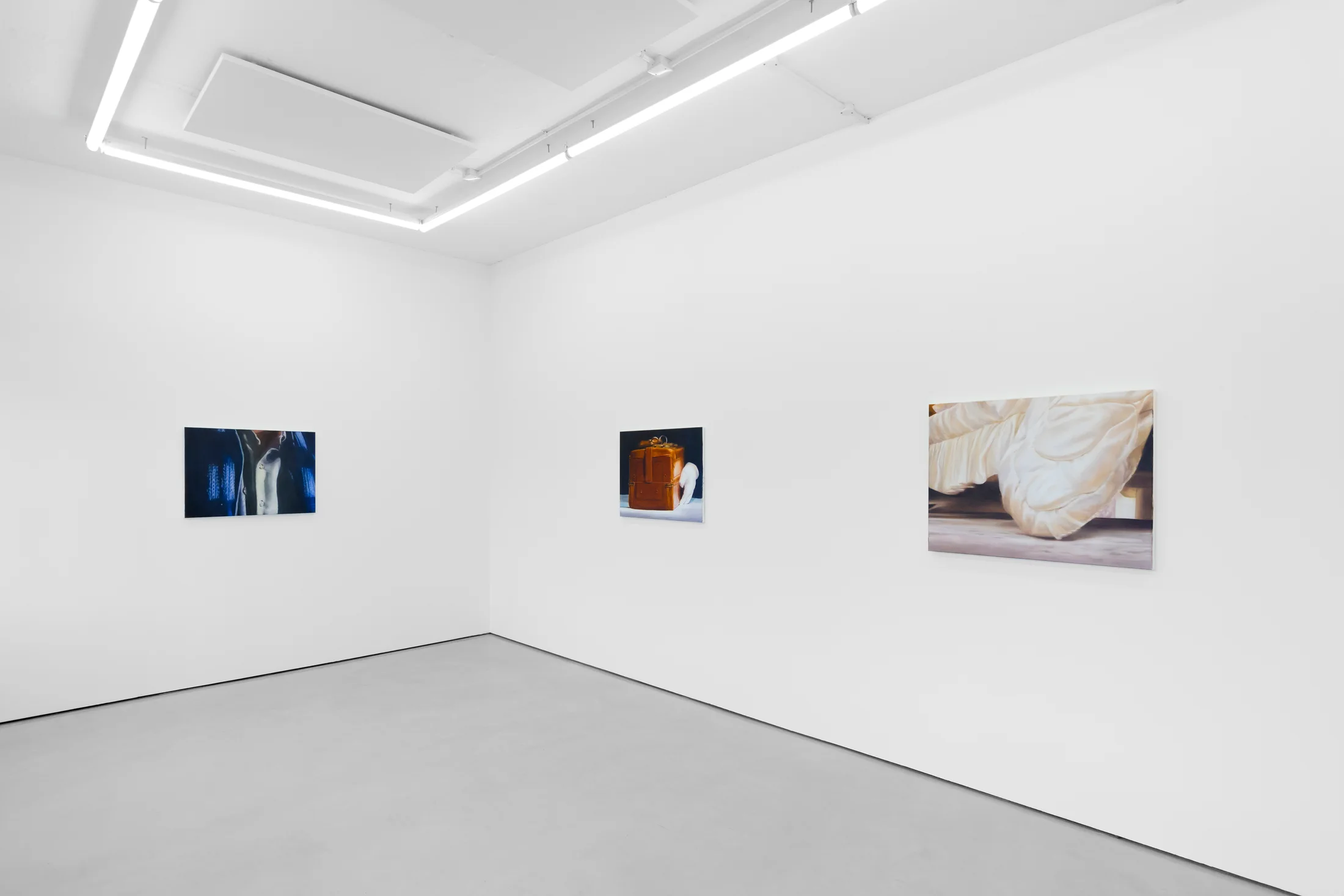 Rachel Lancaster's medium scale oil paintings of domestic objects from cinema are hung in a spacious white gallery space