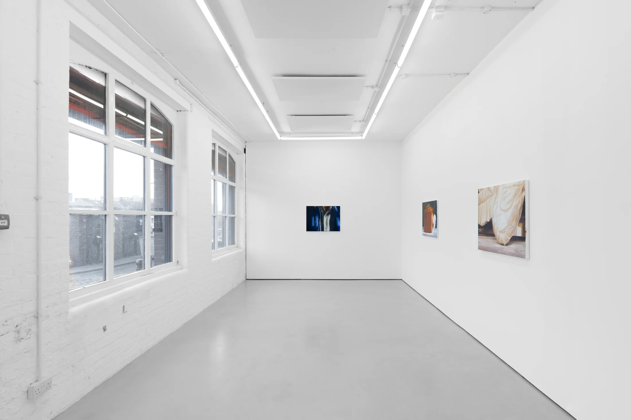Rachel Lancaster's medium scale oil paintings of domestic objects from cinema are hung in a spacious white gallery space