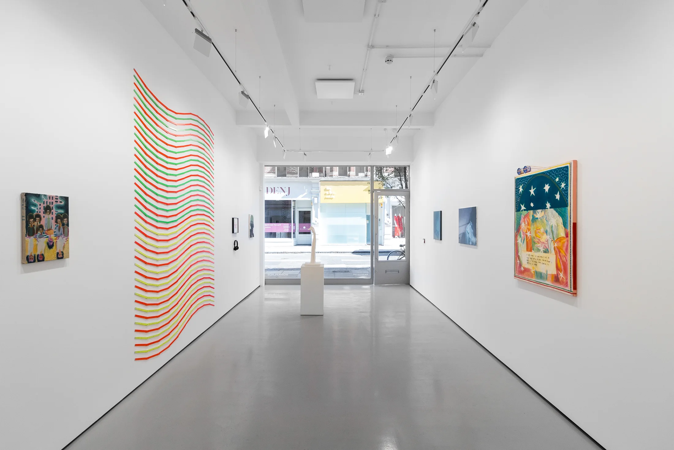 Installation views of 'Kaleidoscope' the inaugural group exhibition at Workplace in 50 Mortimer Street, Fitzrovia, London.