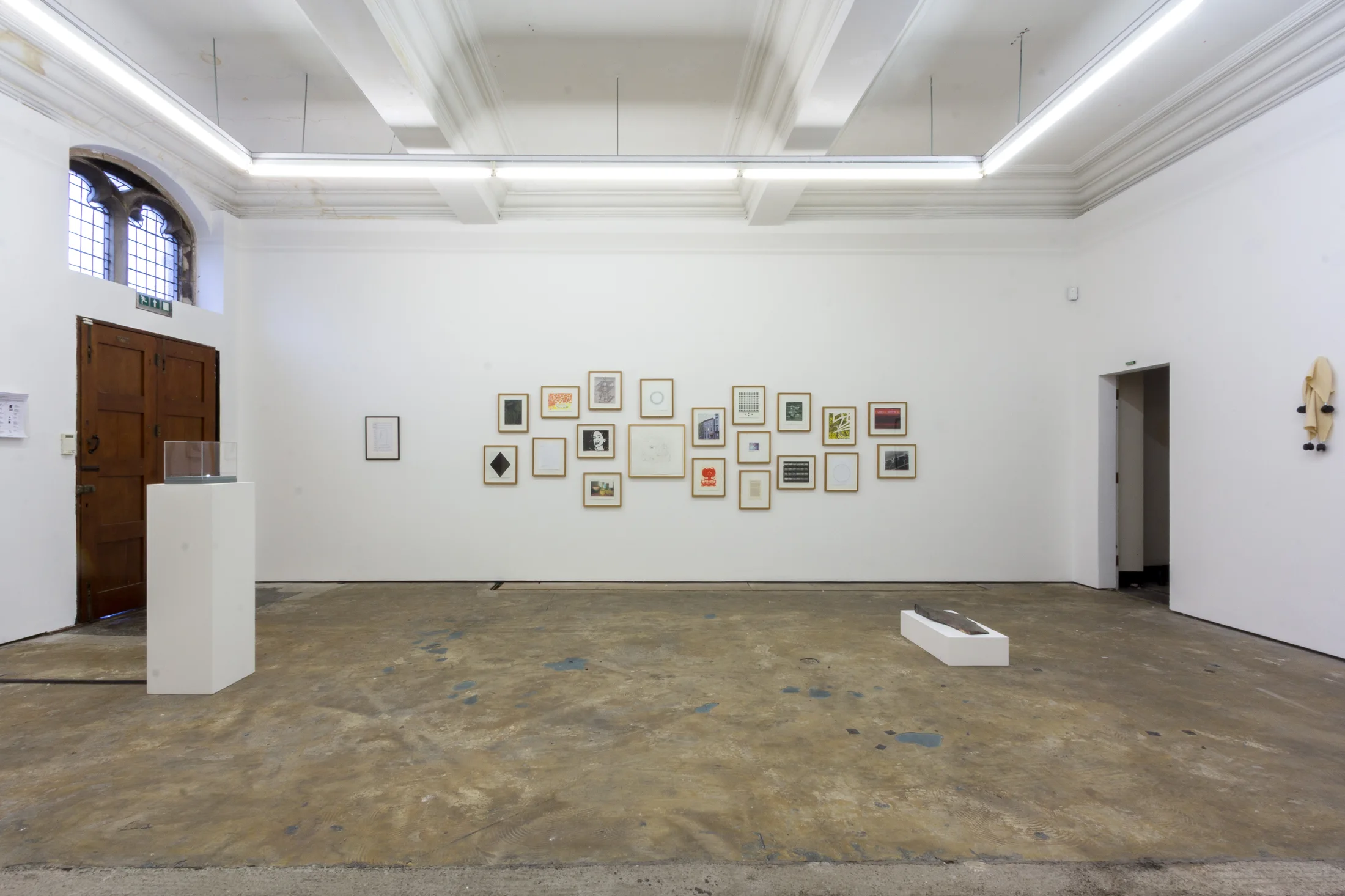 Intsallation views of The Collective at Workplace Gateshead, framed works on walls and sculpture in a white gallery space