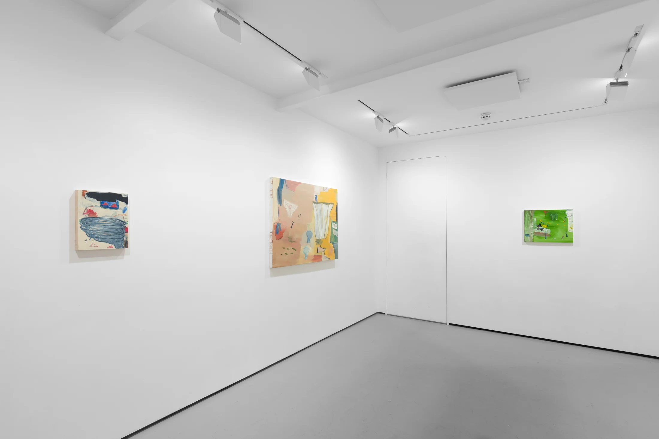 A white walled gallery with 4 artworks by b chehayeb hung on the walls