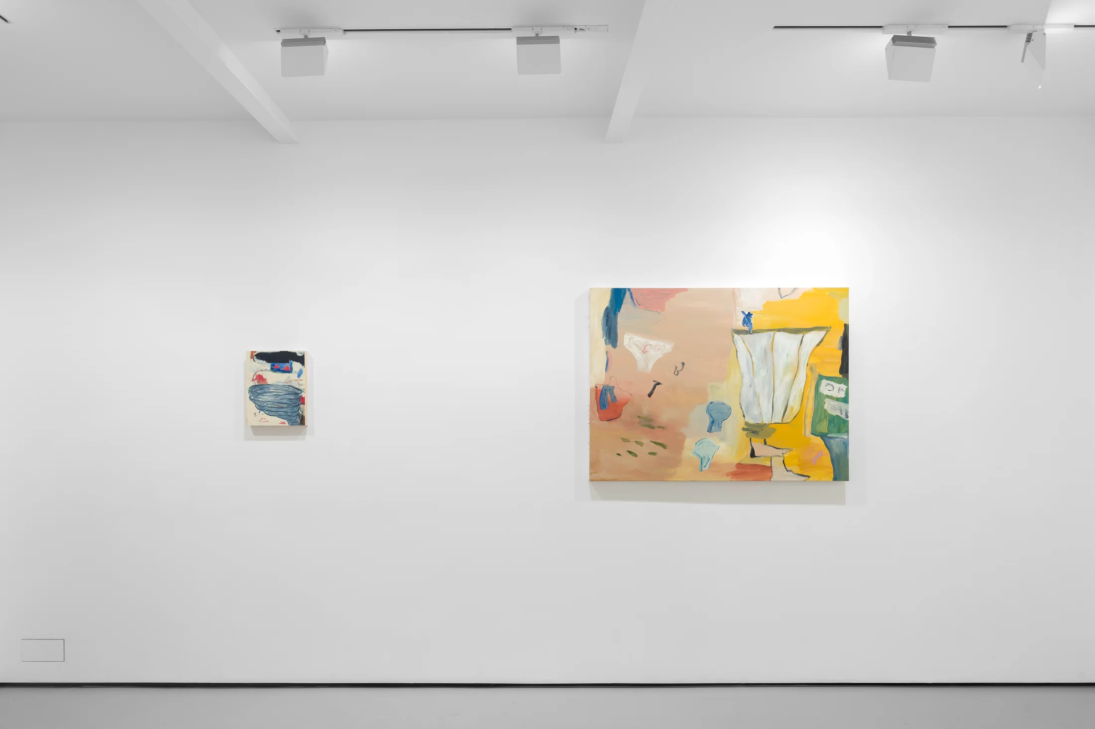 A white walled gallery with 4 artworks by b chehayeb hung on the walls