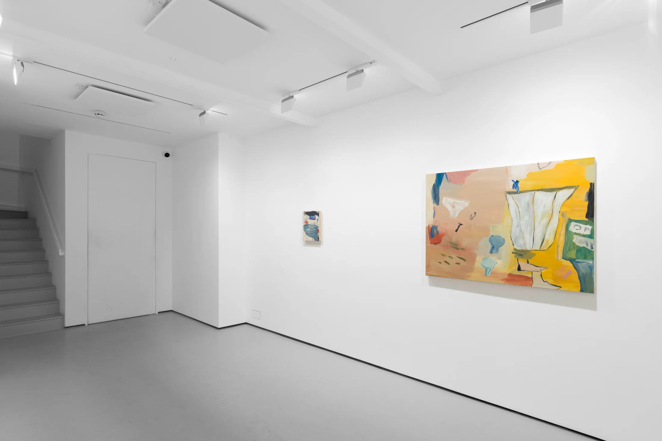 A white walled gallery with 4 artworks by b chehayeb hung on the walls