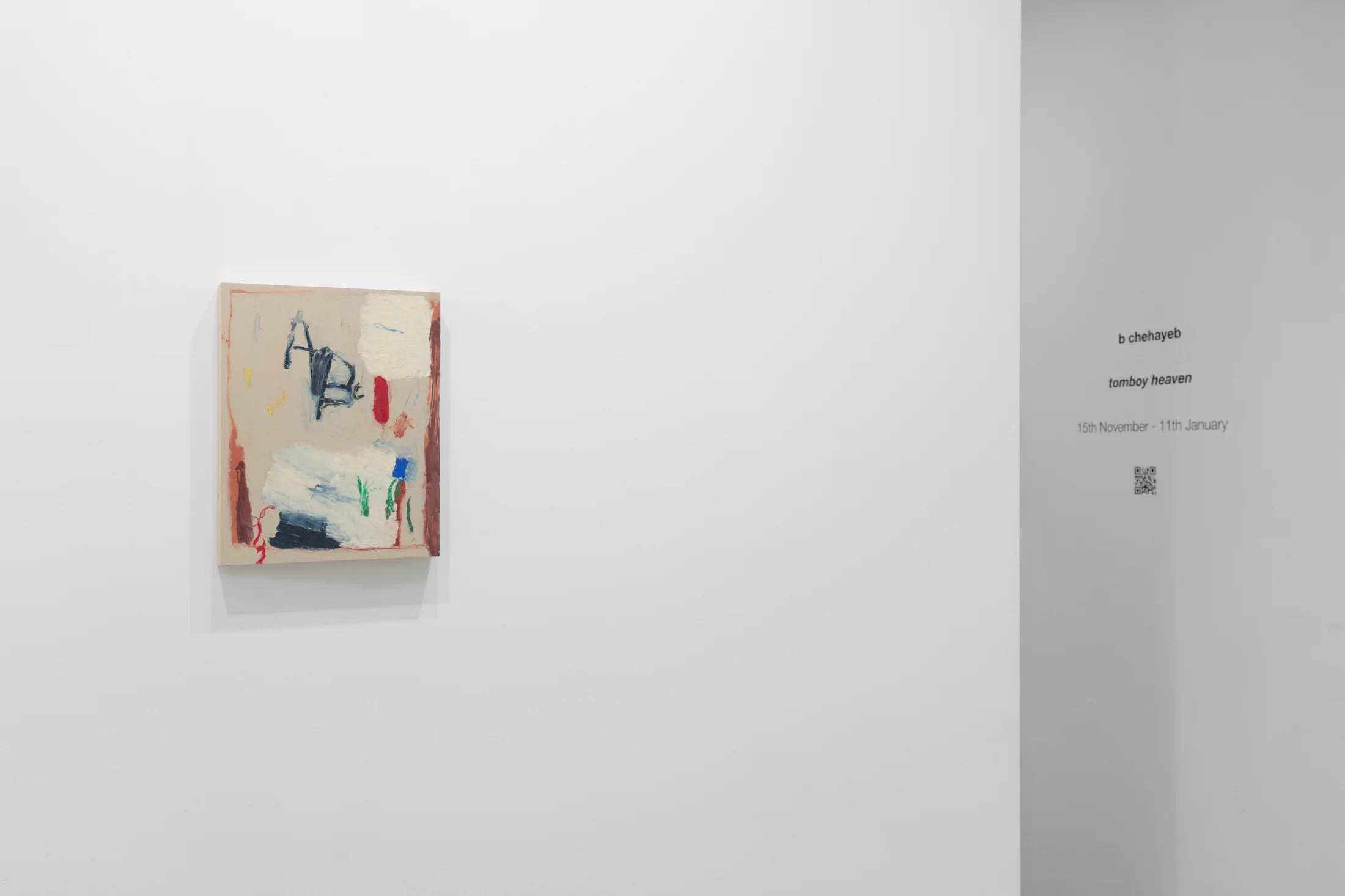 A white walled gallery with 4 artworks by b chehayeb hung on the walls