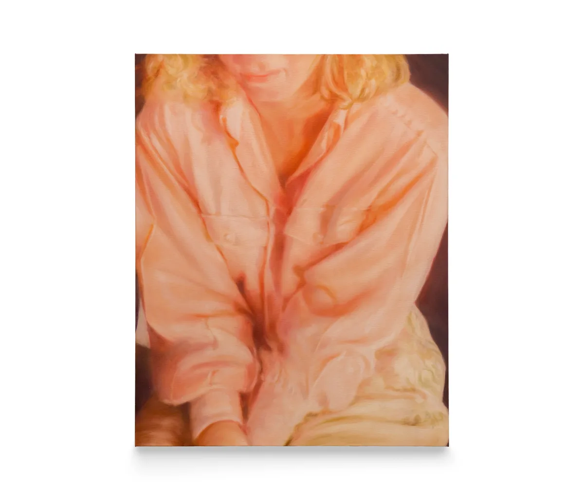 A painting by Rachel Lancaster of a woman wearing a salmon coloured shirt